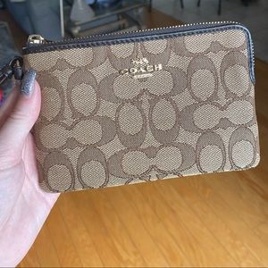 Coach Corner Zip Wristlet In Signature Canvas